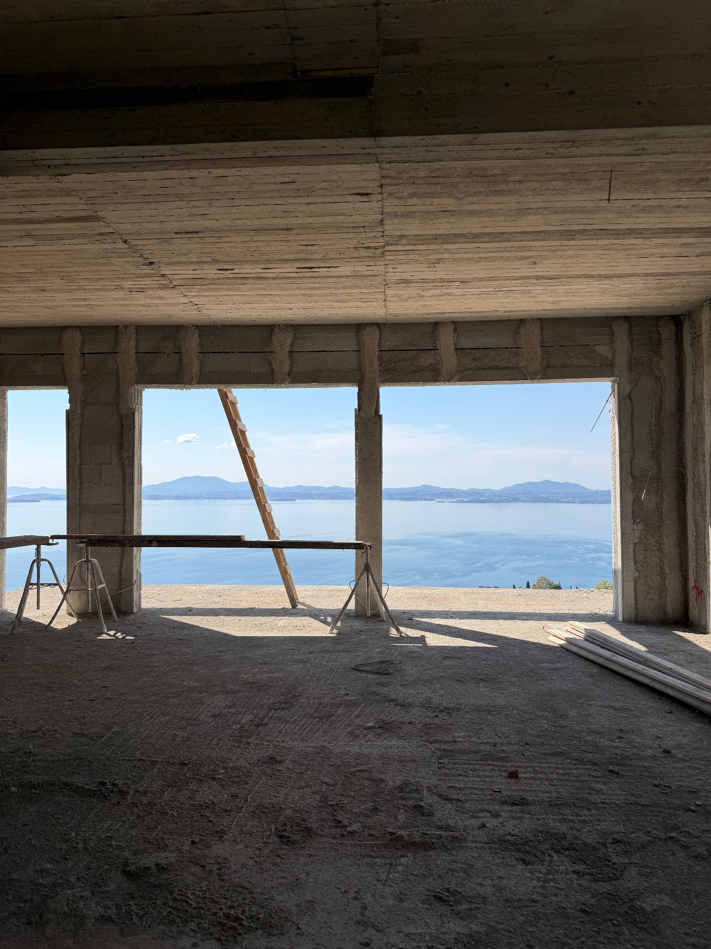 New-build Corfu villa under construction framing panoramic sea views